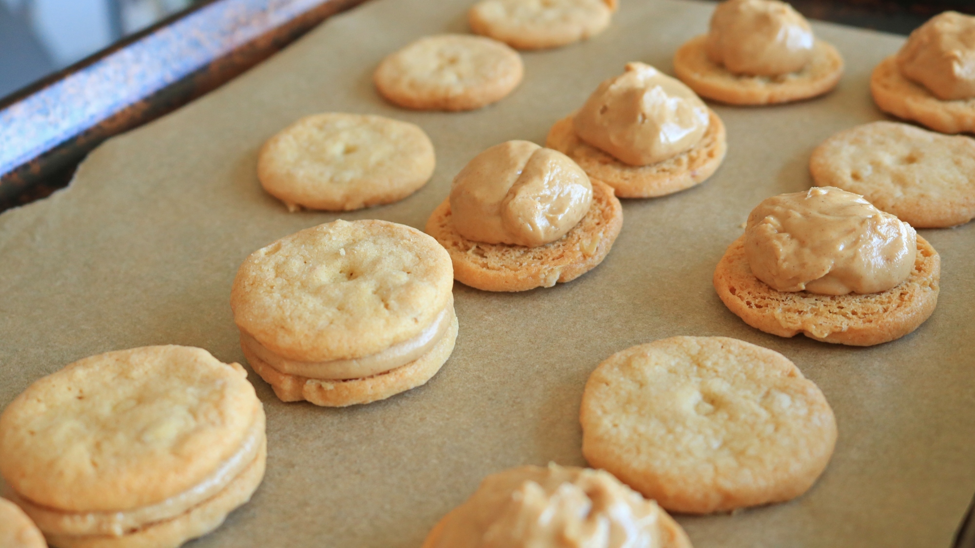 Cookies in the process of being filled.