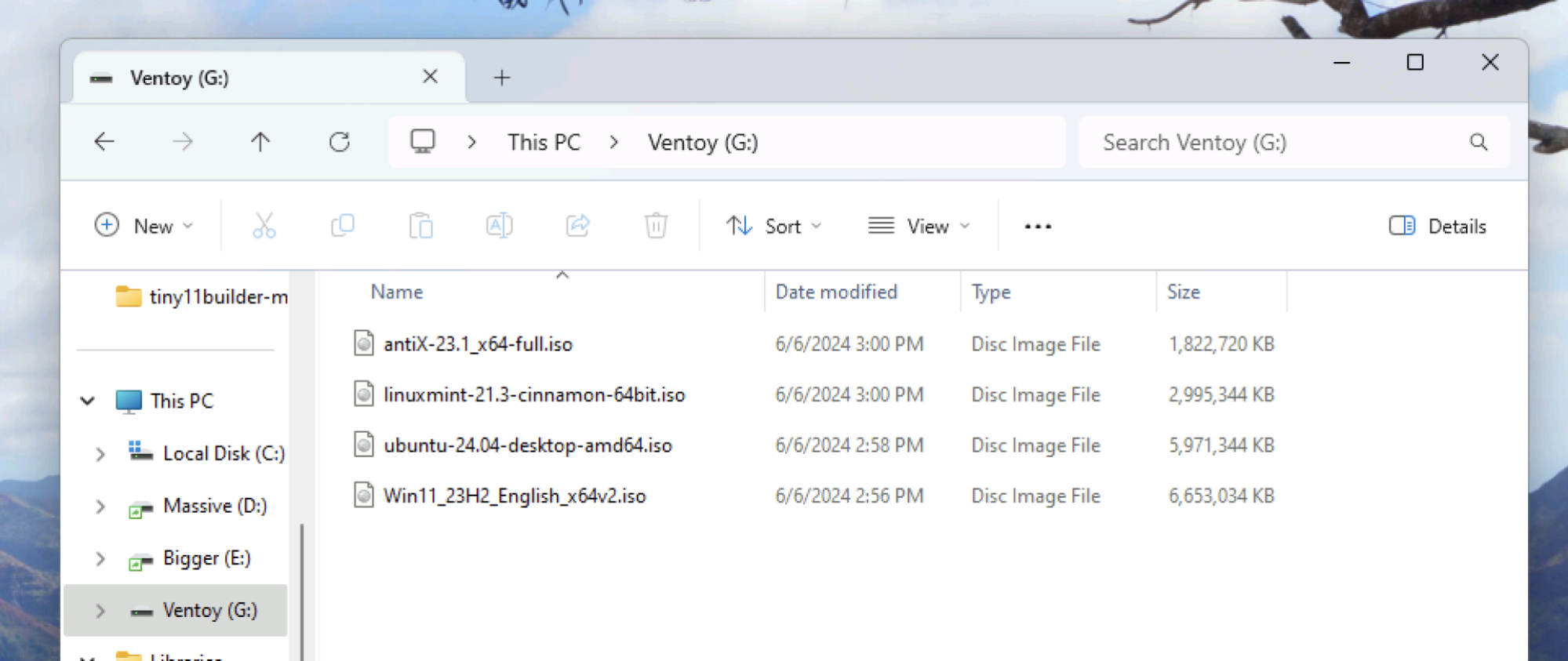 A Ventoy partition shown in Windows' File Explorer. There are four ISO files in it. 