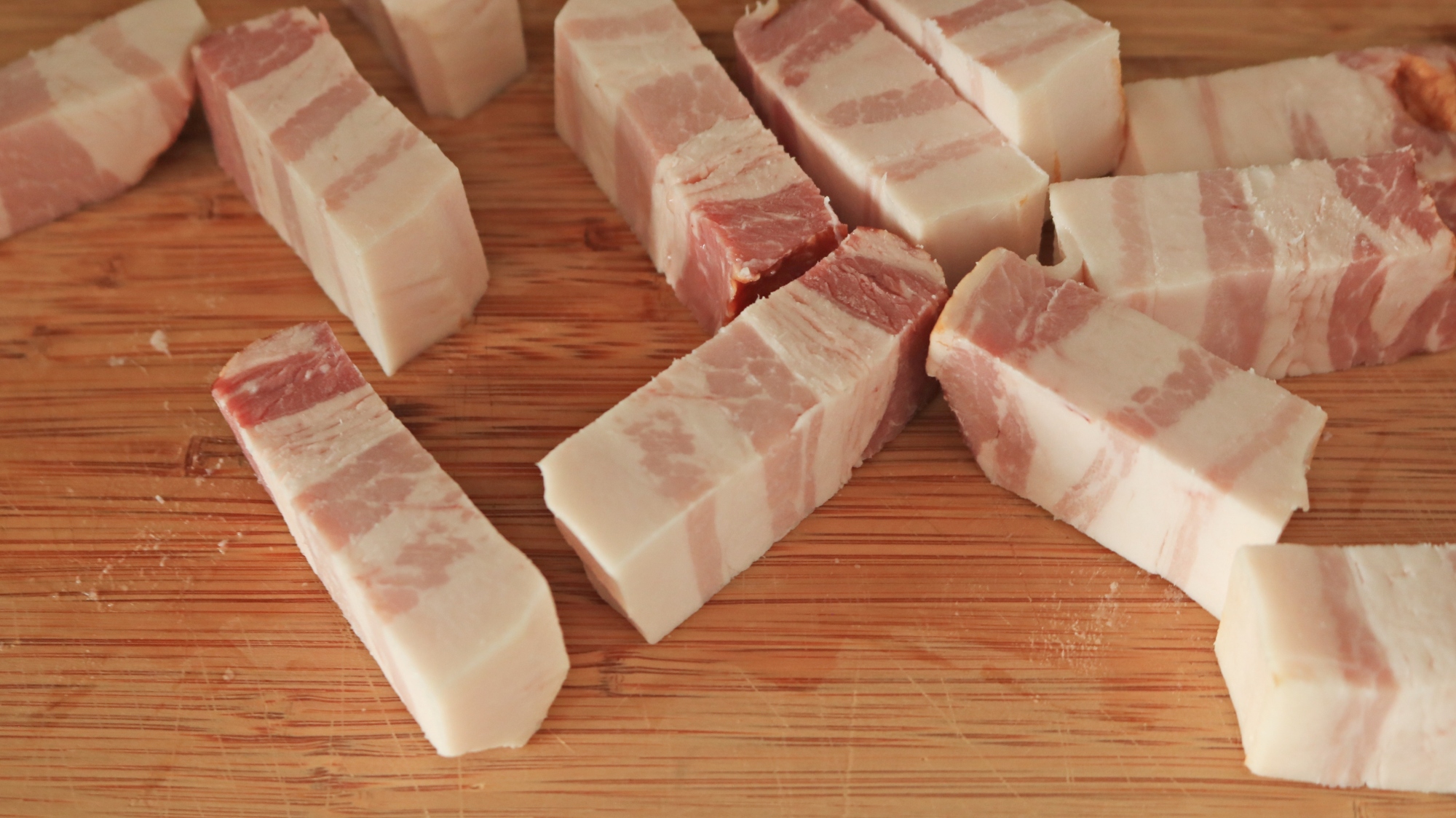 Slices of raw pork belly